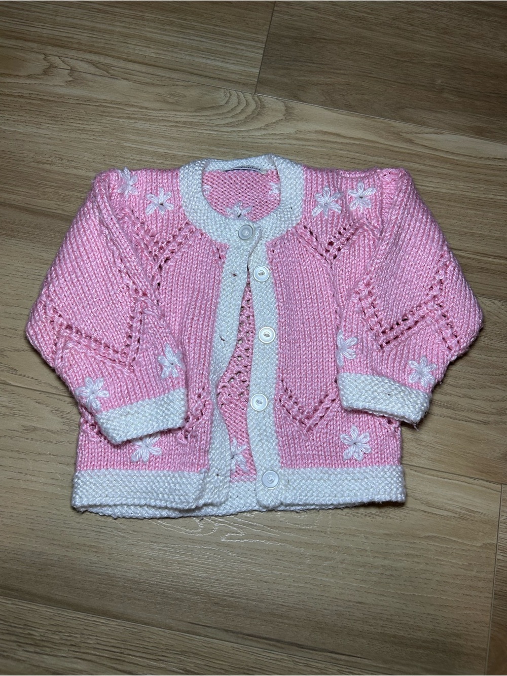 Pink Knit Baby Cardigan with White Trim by